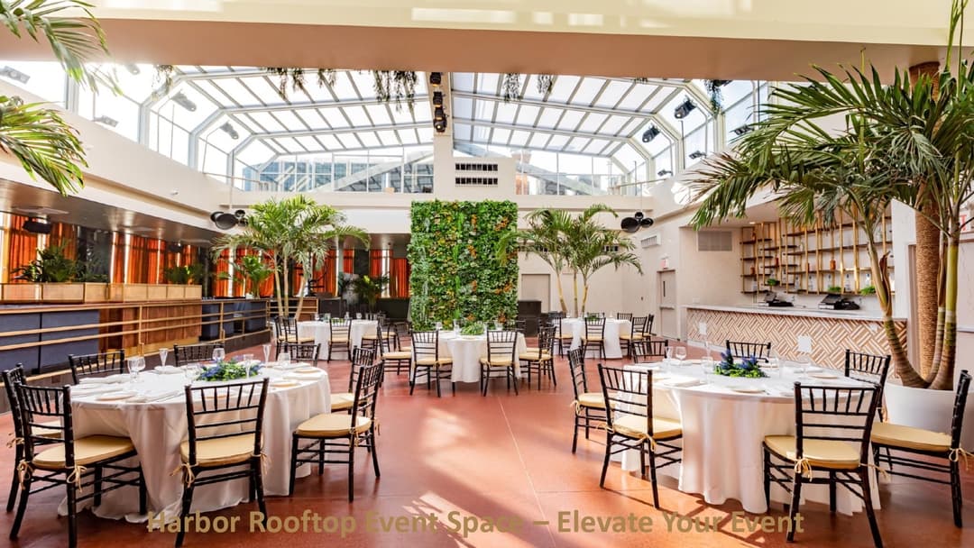 Rooftop level at Harbor NYC with retractable glass roof and tropical decor