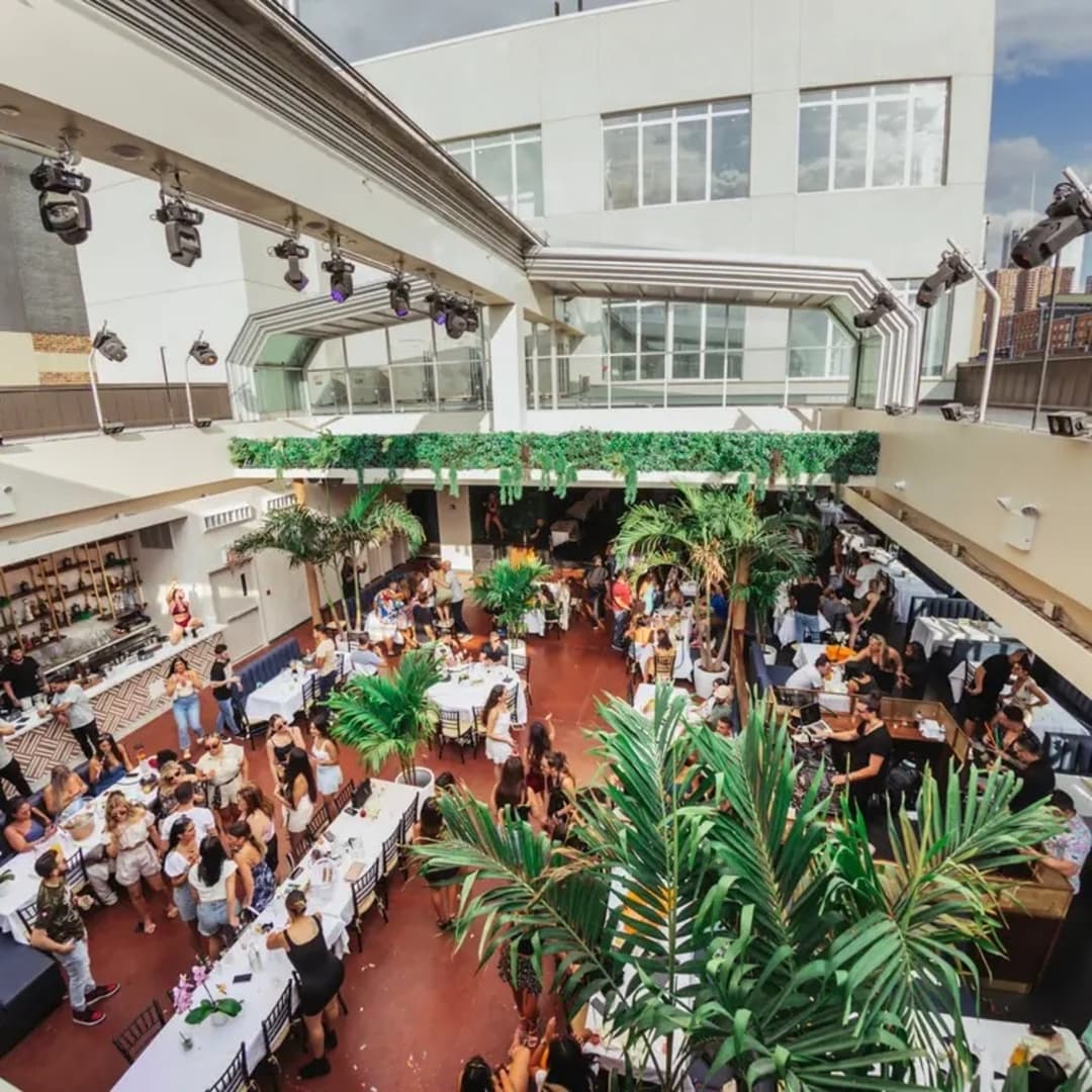 Rooftop level at Harbor NYC with glass walls and event lighting
