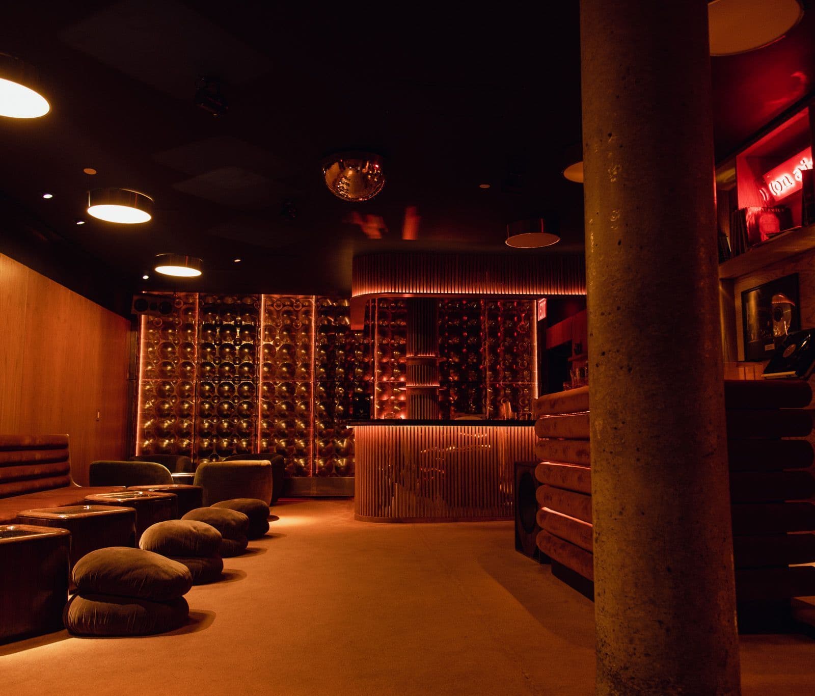 Moody underground lounge with plush seating at Music For A While in Chelsea