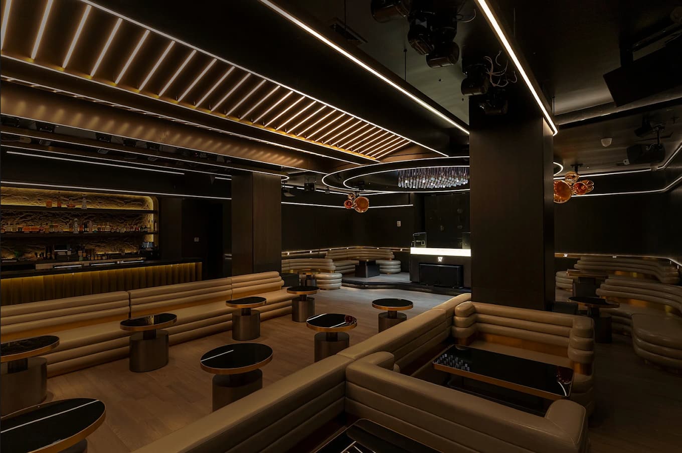 Plush seating and ambient lighting inside Aura 57 lounge on West 57th Street