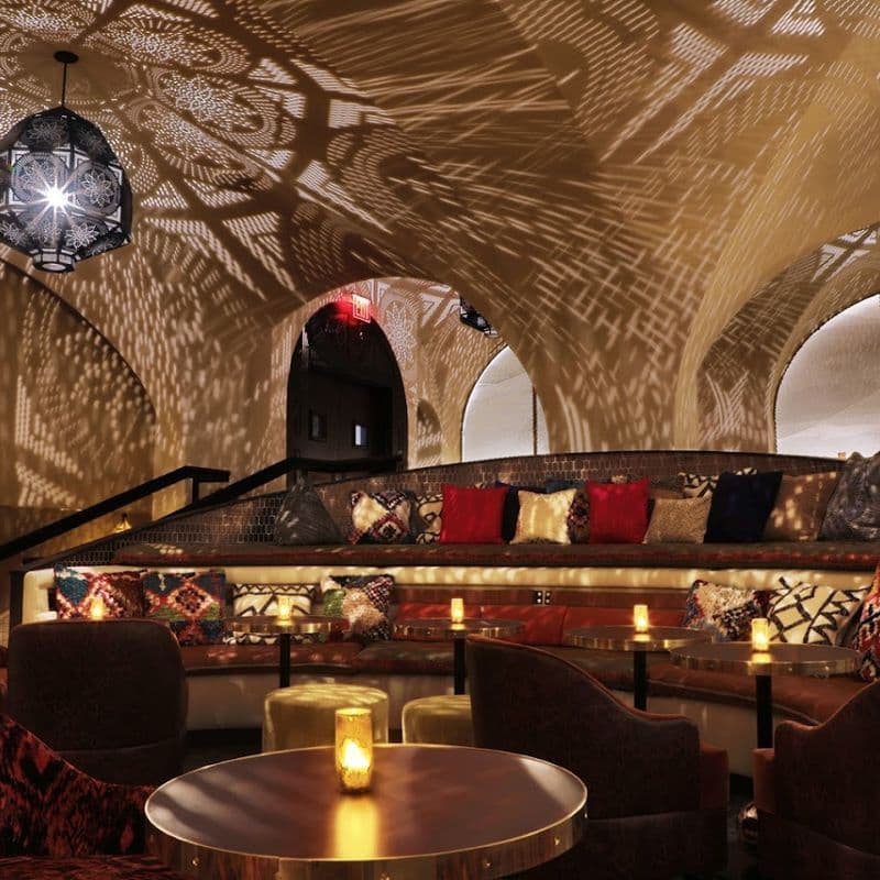 Moroccan-inspired tilework and plush seating at Célon Bar and Lounge in Midtown