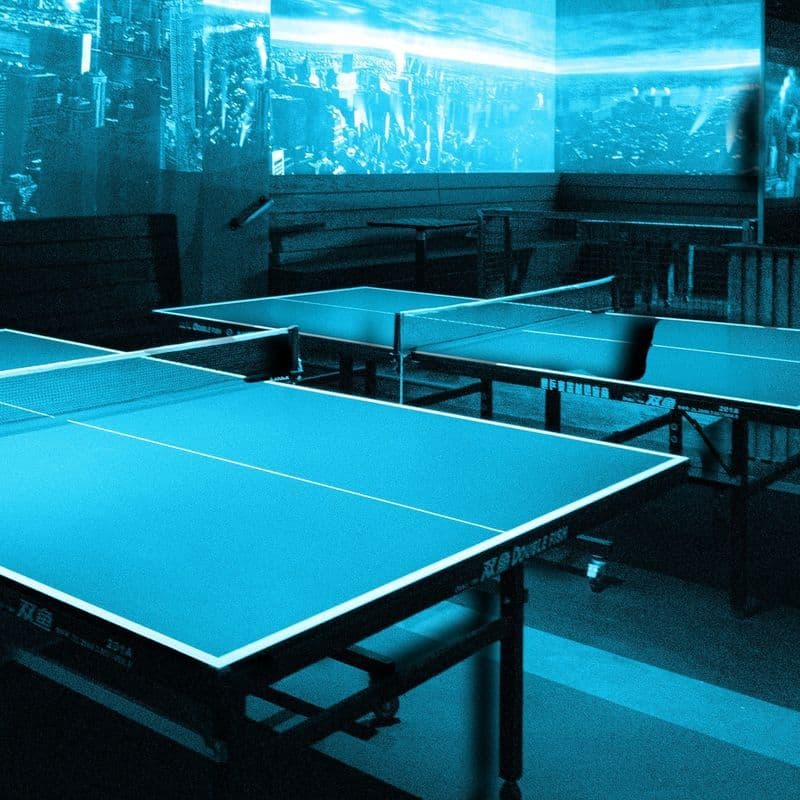 Immersive projection-lit game hall at Sugar Mouse in the East Village
