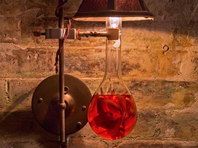 Dim, plush interior and bar at Apotheke Chinatown on Doyers Street