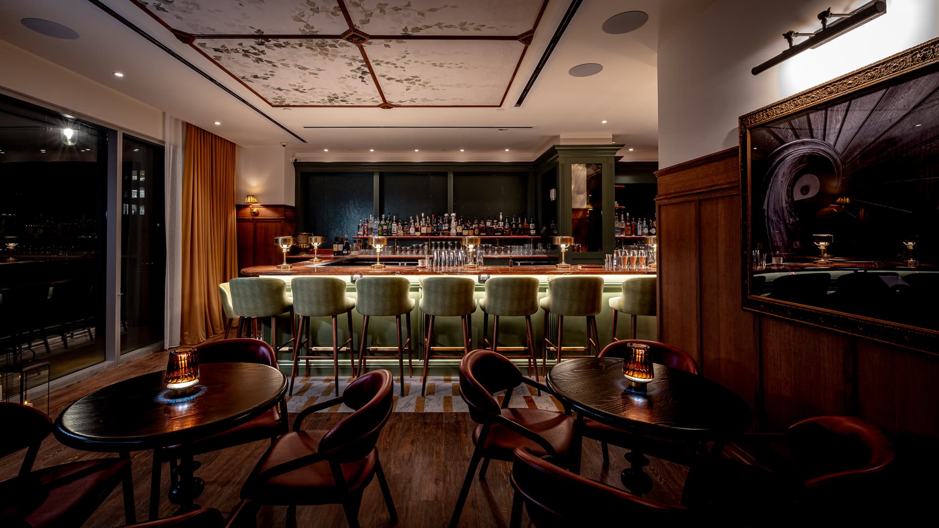 Rooftop bar seating and city views at Golden Child NYC in NoMad