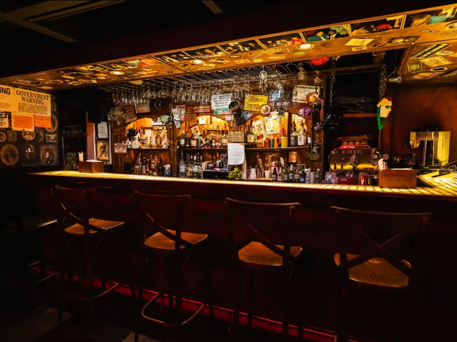 Red-lit multi-level interior at Mehanata Bulgarian Bar on the Lower East Side