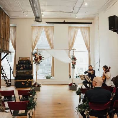 Rustic loft space with high ceilings and large windows at The Farm SoHo