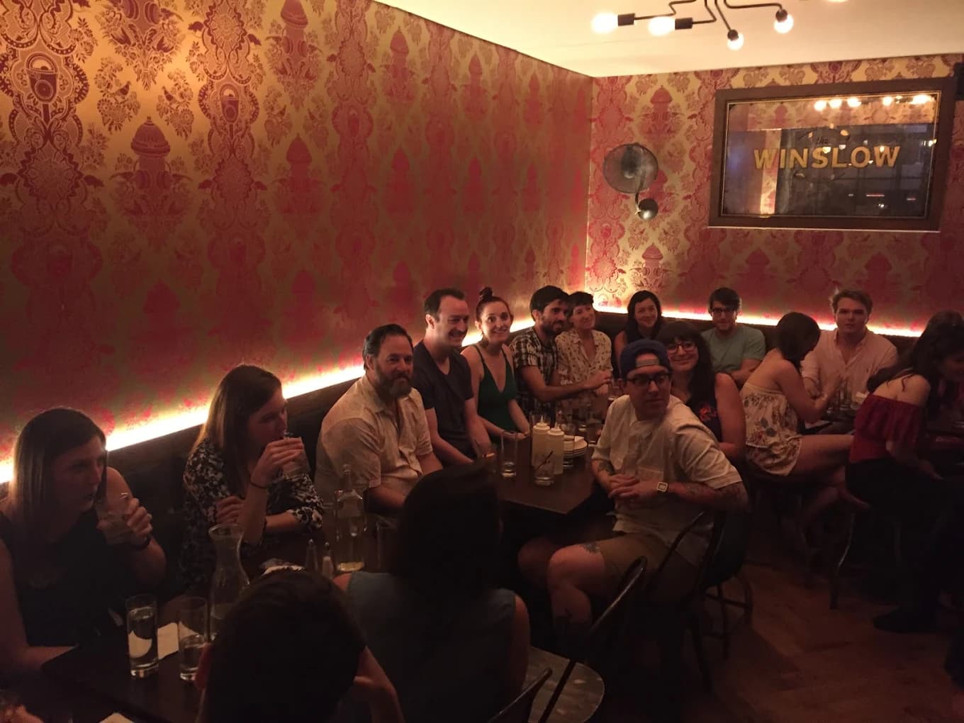 Bar and seating inside The Winslow, a British-style gin bar in the East Village
