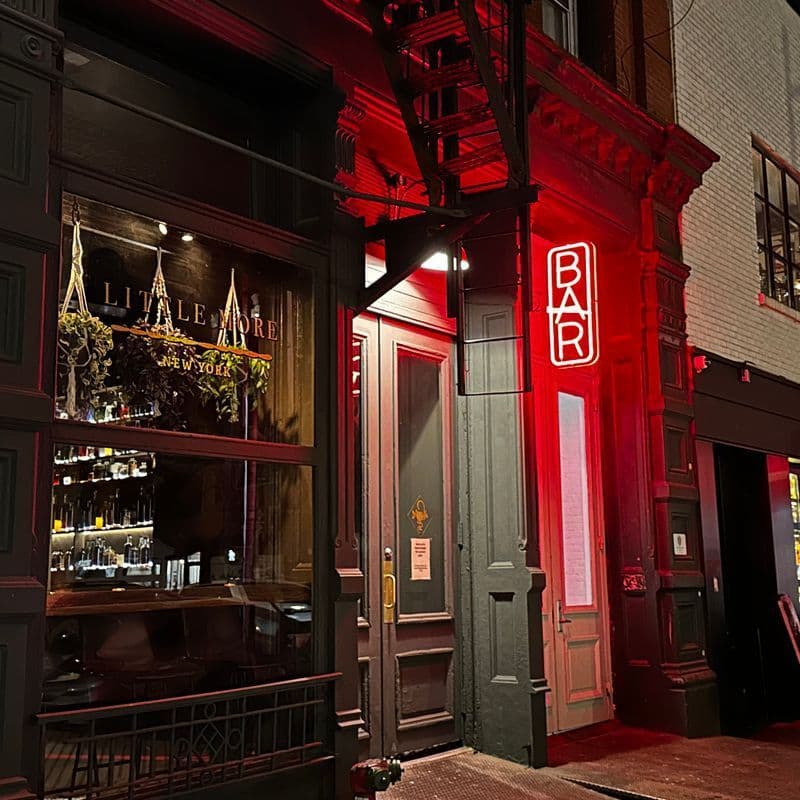 Little More Tribeca bar with 45-foot marble bar and library of spirits