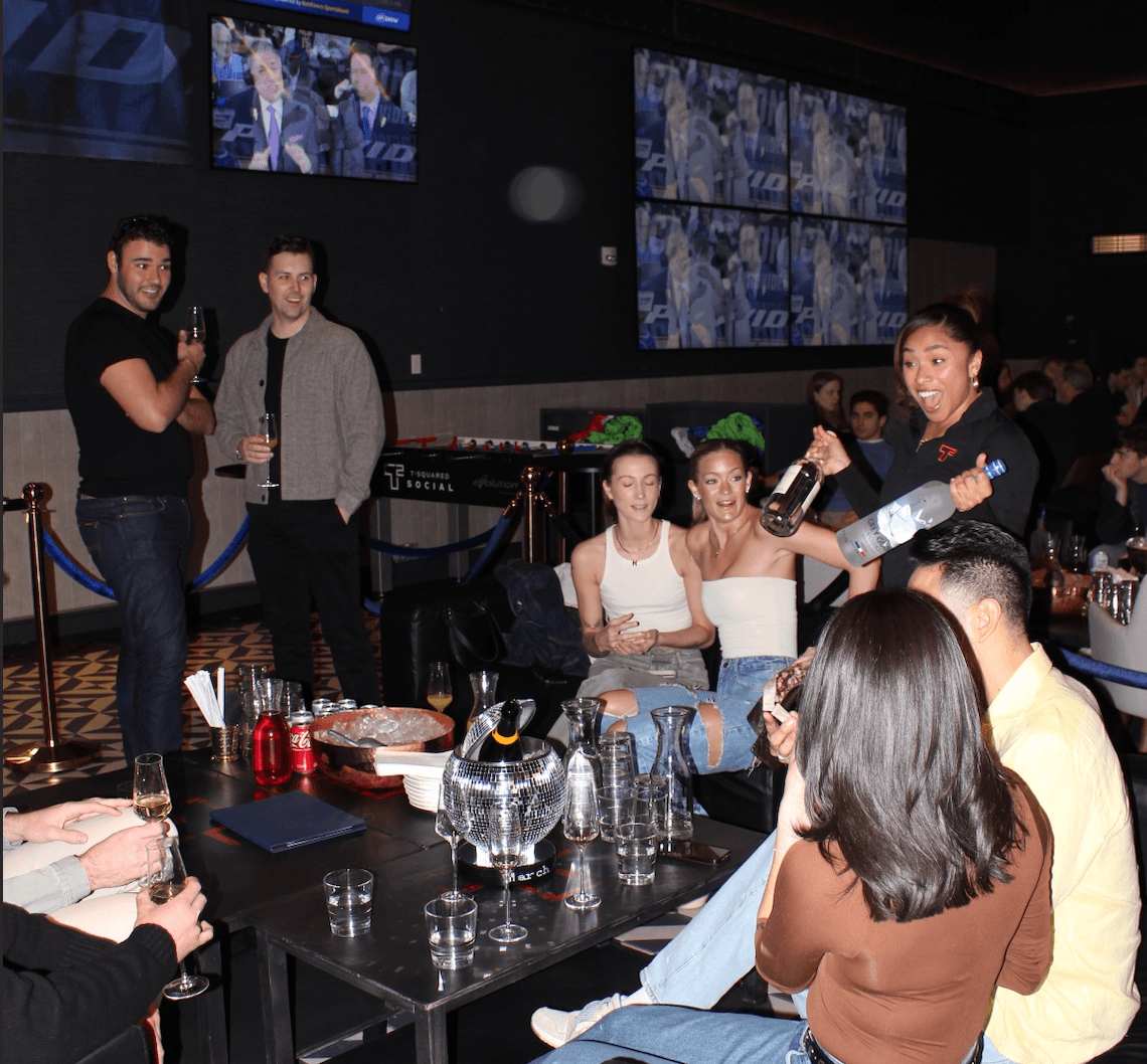 Interior of T-Squared Social in Midtown Manhattan with games and large screens