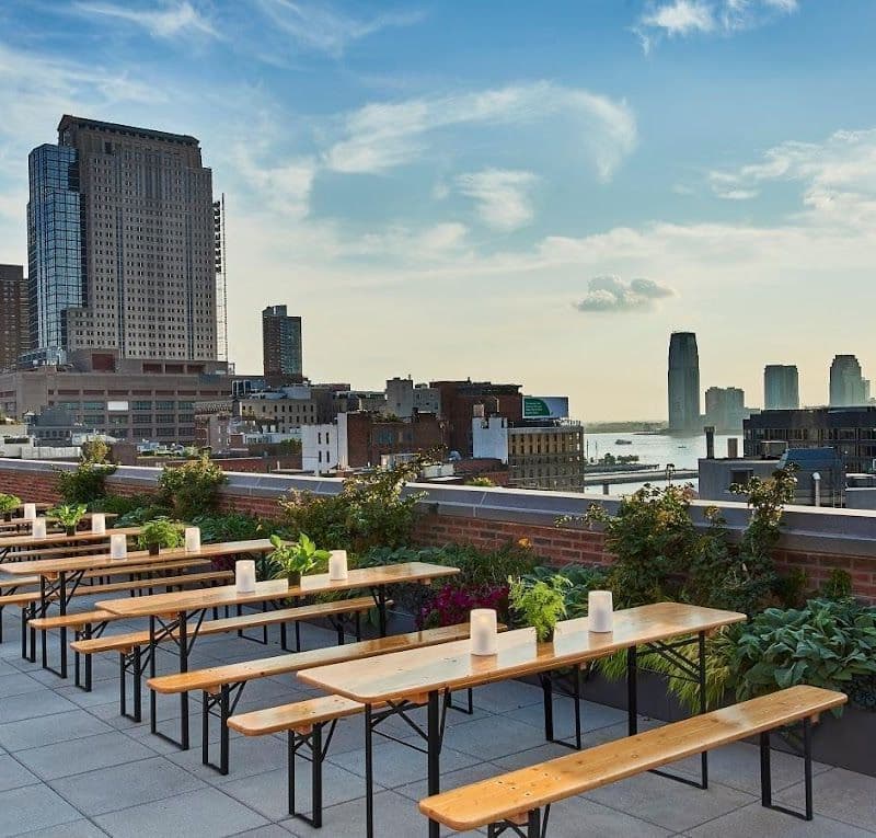 Rooftop bar at ART SoHo with views of the downtown Manhattan skyline