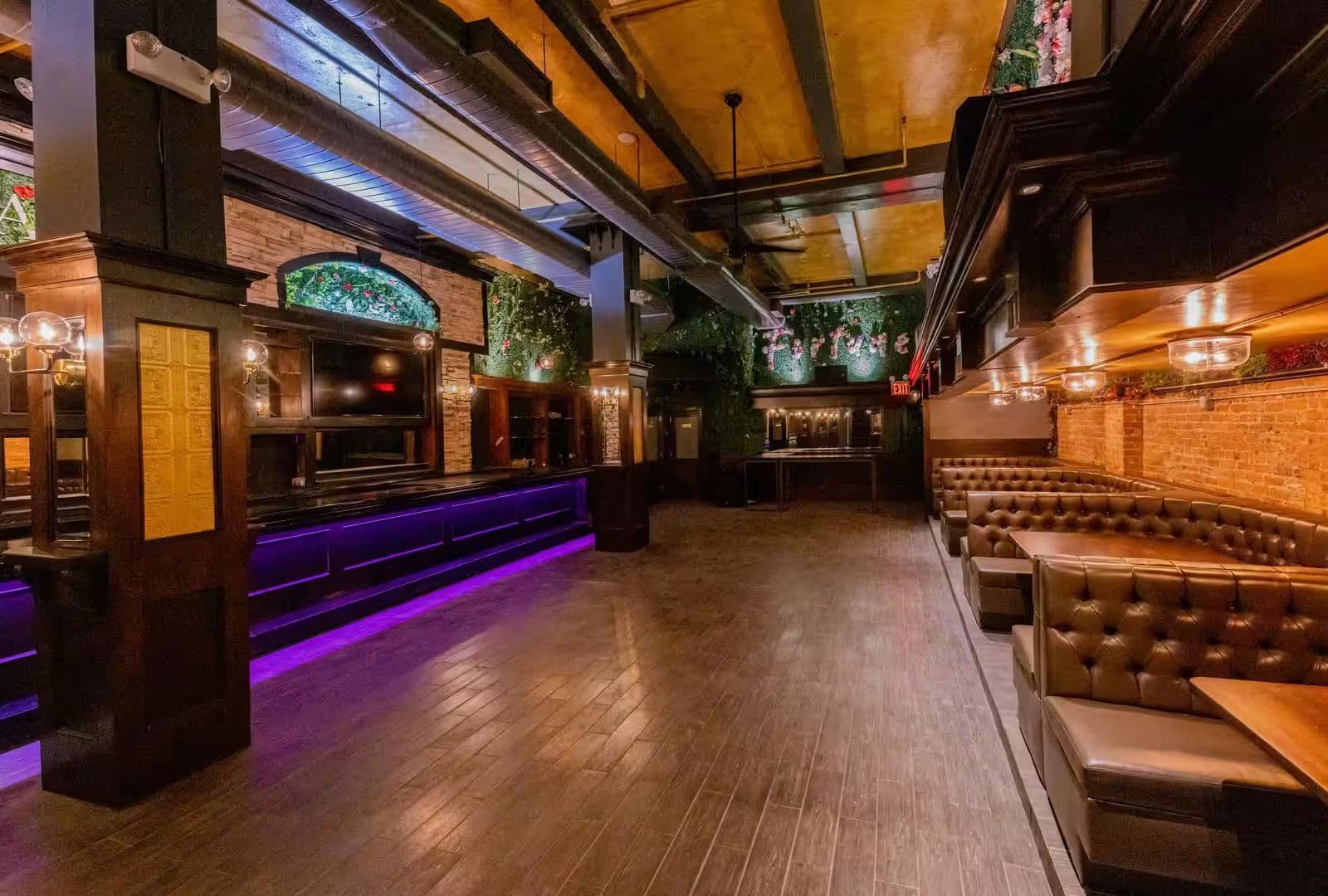 The Dean NYC neon and greenery bar interior Garment District